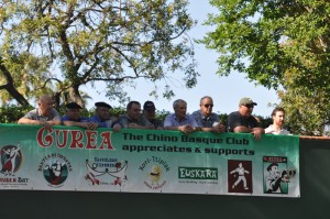 A crowd watches the action on the court from above.