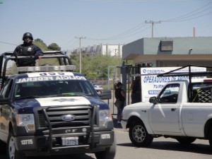 Heavily armed police patrol the streets of Juarez. Photo: Courtesy of Judith Torrea