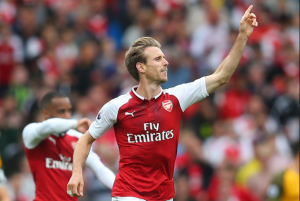 Basque soccer player Nacho Monreal pointing in the air