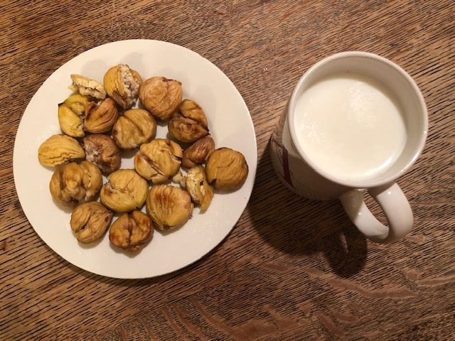 My family in the Basque Country ate their roasted chestnuts with warm milk.