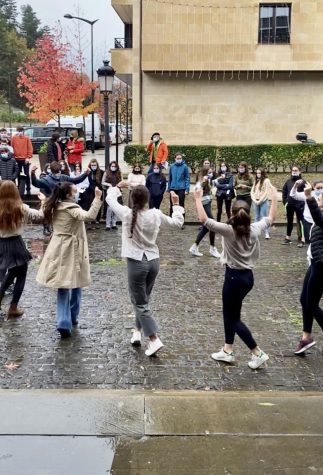 Young Basque students dancing in the street in the town of Lazkao, Spain