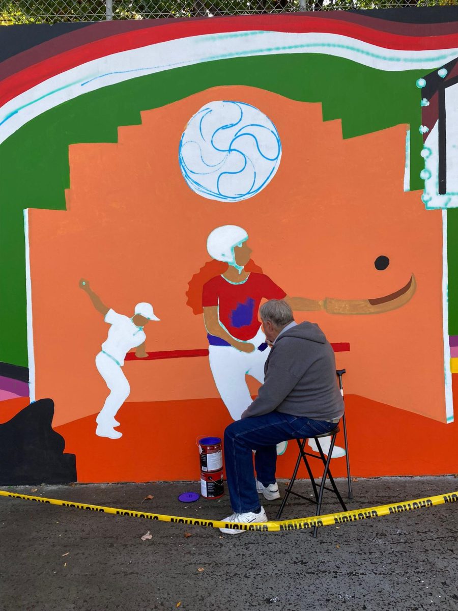 Members of the community helped paint the new mural in Reno.