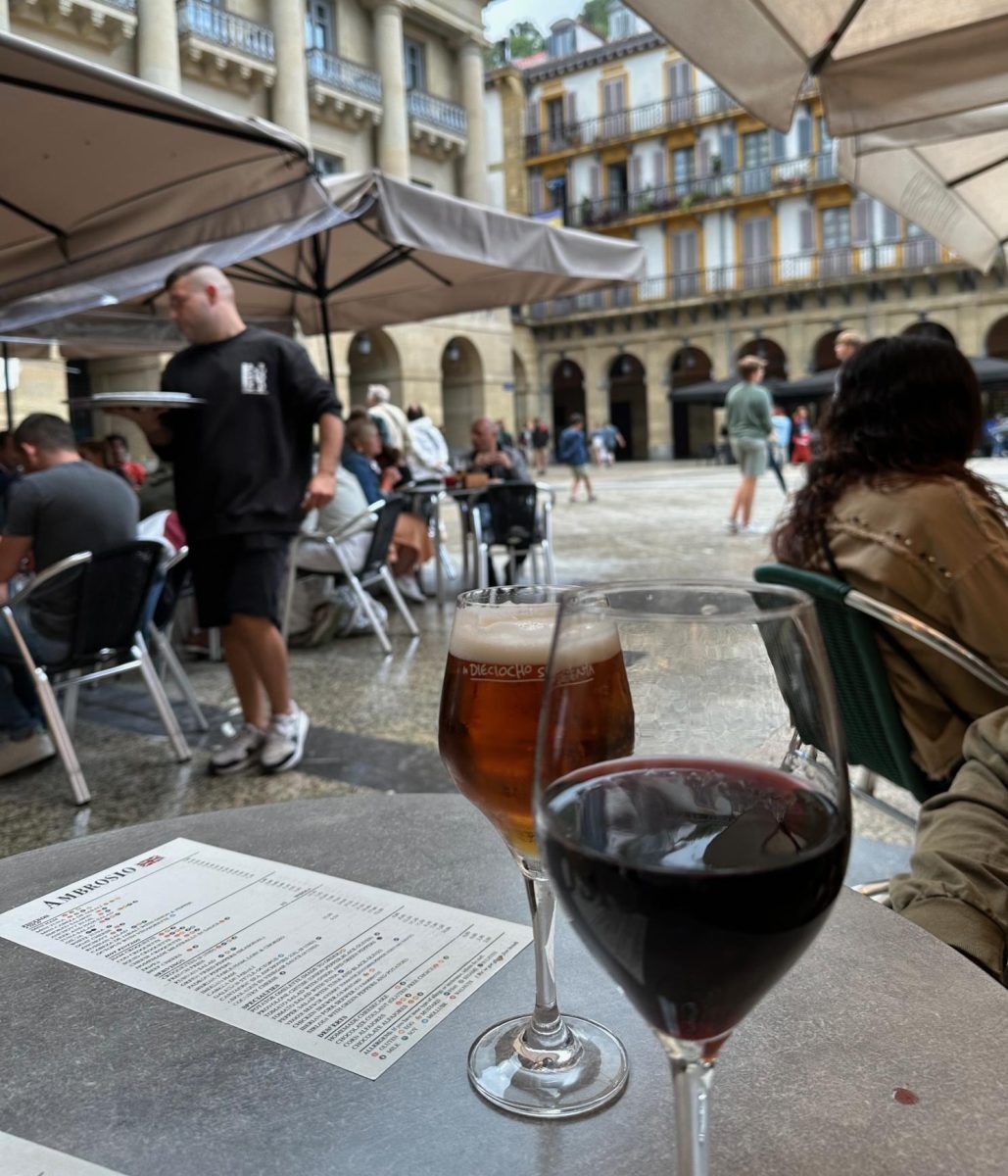 Visitors enjoy drinks in Constitution Plaza in Donosti, Spain