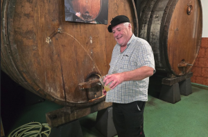 Pouring the cider at the Aialde Berri ciderhouse. Courtesy of Michael McCay