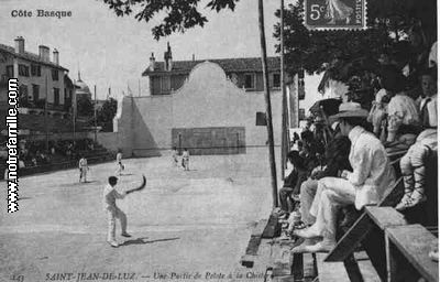 Men playing chistera at a handball court in St. Jean de Luz, France
