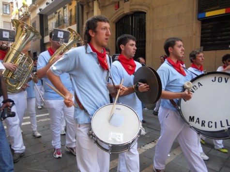 Drummers playing in street during summer festival in the Basque Country