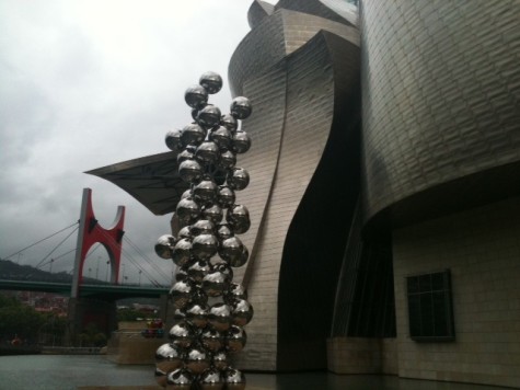A sculpture outside the Guggenheim Museum with the Salve bridge in the background