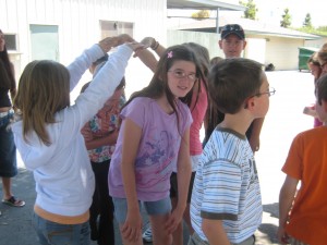 Campers learn traditional dances and songs.
