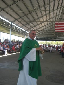 Father J.P. Cachenaut blesses the new pavillion