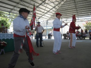 Klika members twirl their batons 