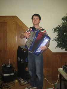 Accordionist Alexandre Laborde plays for singer Michel Etcheverry.