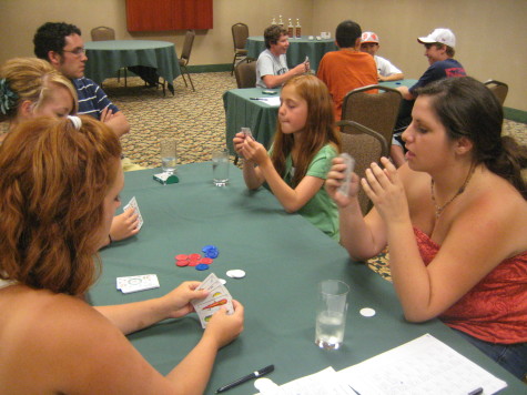 Youngsters playing the Basque card game mus.