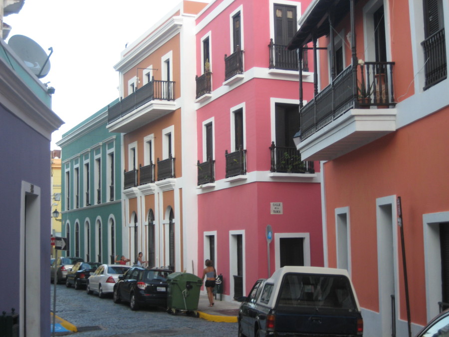 Houses+in+Old+San+Juan+are+painted+in+pink%2C+orange%2C+blue+pastel+colors.